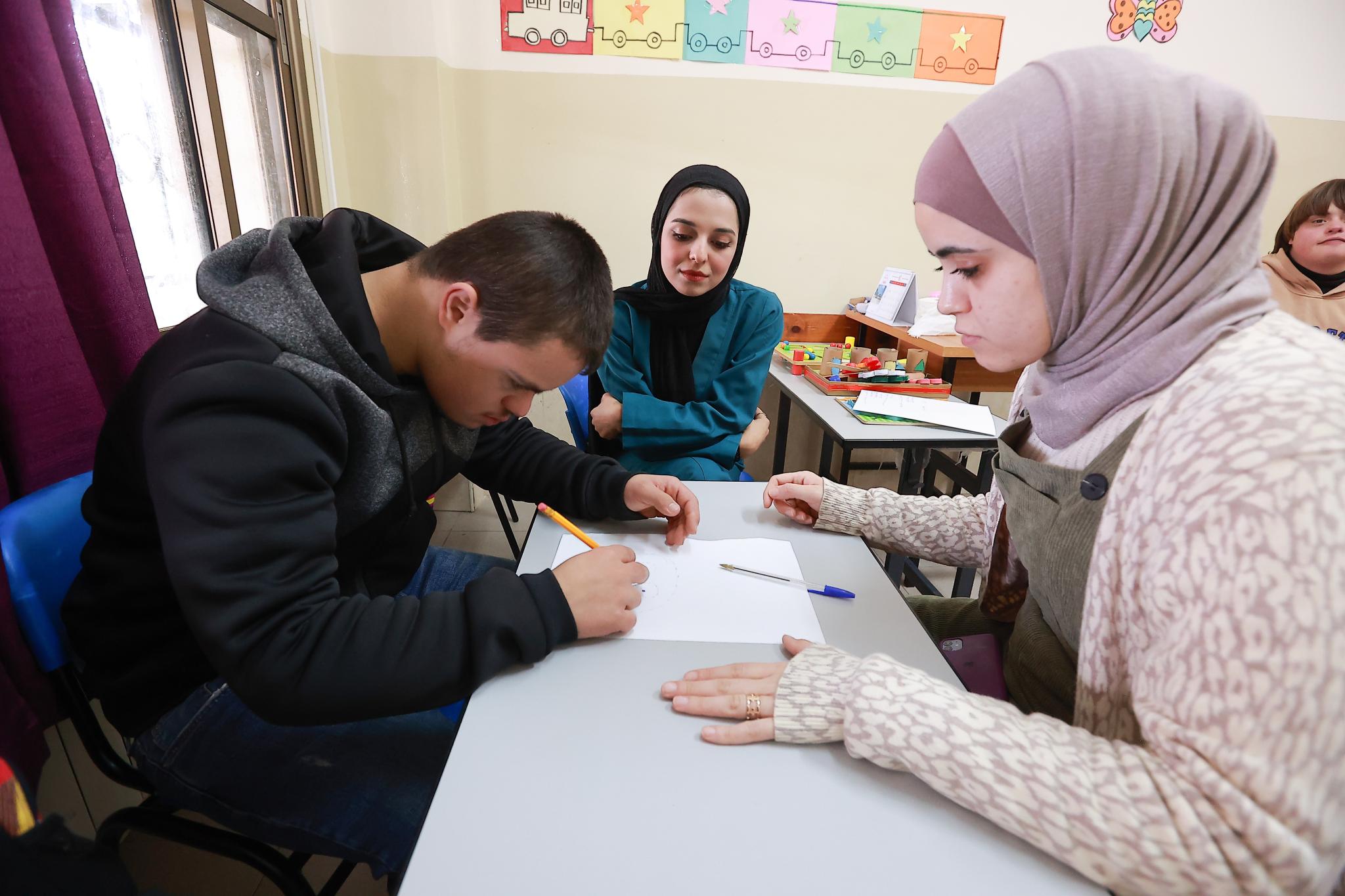The Arab American University Holds an Activity for People with Special Needs