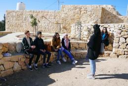 Interior Architecture students of AAUP while listening to an explanation about the old town of Kofor Aqab in their field trip to the place