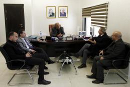 Discussing enhancing cooperation with The National Bank 
