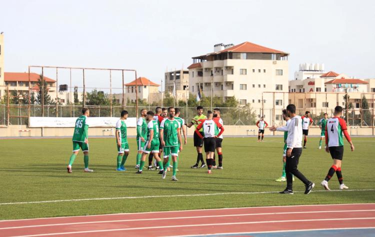 Photos from the Soccor Game between Islami Qalqilya Team and Silwan Team among the Palestinian Partial Professional League that was Hosted by AAUP Stadium
